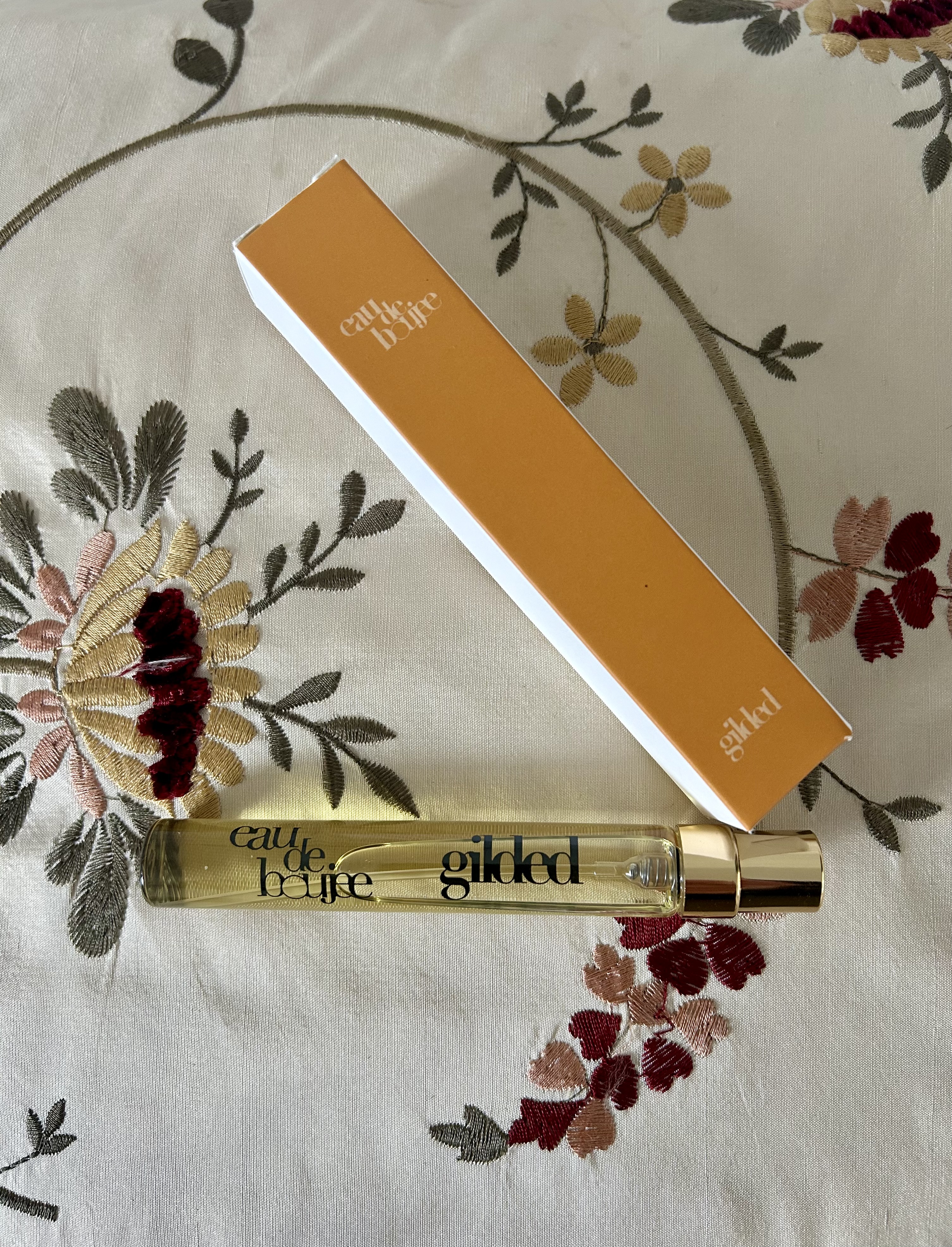 Travel vial of Gilded perfume by Eau de Boujee.